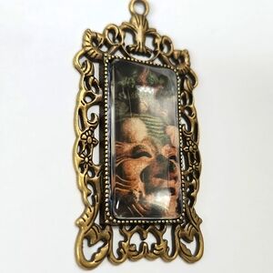 Artsy antique style pendant